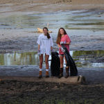Girls helping clean up Cherokee Lake