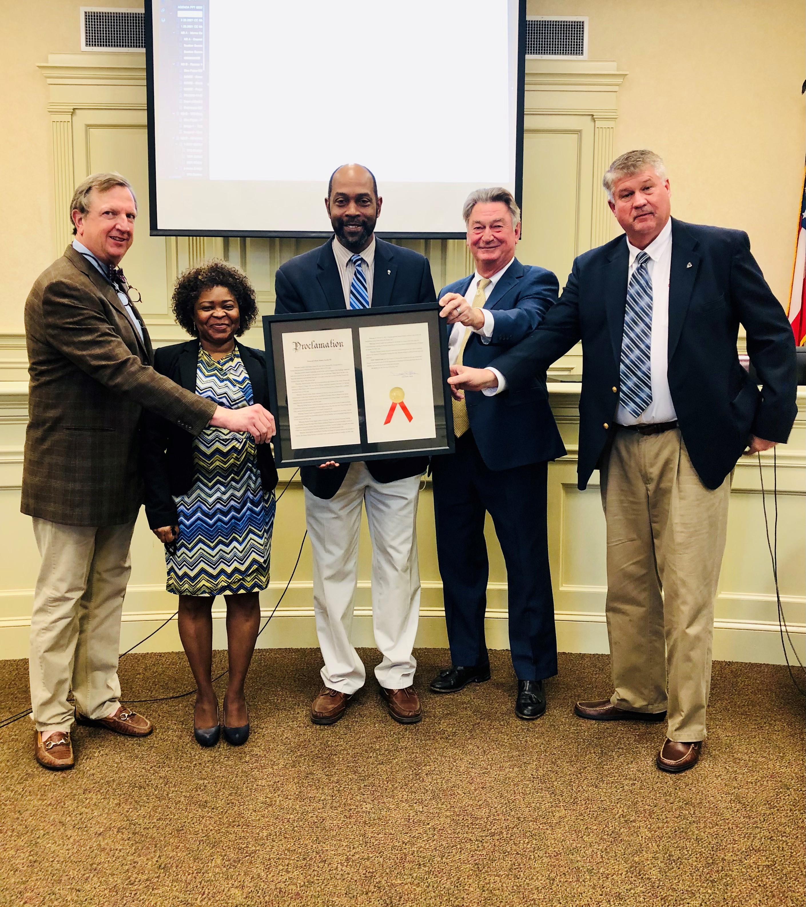 City Council Proclamation presented to retired General Lloyd James Austin III